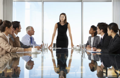 Group Of Business People Having Board Meeting Around Glass Table Group Of Business People Having Board Meeting Around Glass Table