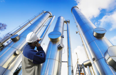 oil-worker, engineer with large oil and gas pipes, pipelines, sl oil-worker, engineer with large oil and gas pipes, pipelines, sl